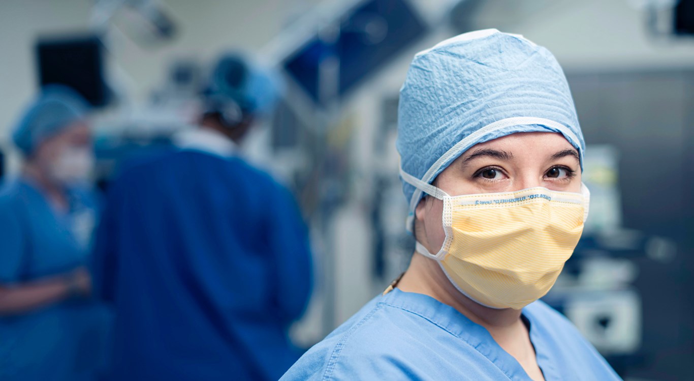 member of hospital staff  in surgical mask
