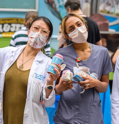 Crowd of medical staff eating ice cream